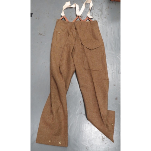 275 - Pair Of 1940 Dated Battledress Trousers
khaki woollen, wide leg trousers.  Side slash pockets .... 