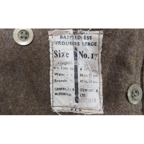 275 - Pair Of 1940 Dated Battledress Trousers
khaki woollen, wide leg trousers.  Side slash pockets .... 