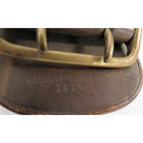 296 - WW1 Dated Officer's Sam Browne Belt and Holster Set
consisting brown leather belt with brass fitting... 