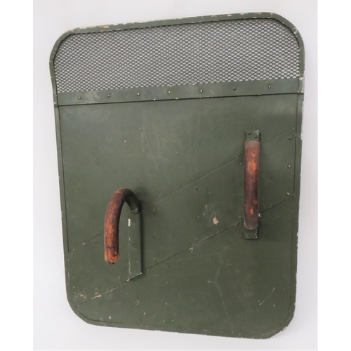 316 - Early Post War British Army Riot Shield
green painted, rectangular alloy shield.  The top with ... 