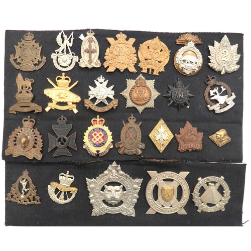 25 x Canadian Cap Badges
including white metal KC A&S Canada ... Bi-metal Nova Scotia Highlanders ... Brass QC Windsor Reg ... Brass KC Canadian Provost Corps ... Brass KC 32 Manitoba Saskatchewan Reg ... Bi-metal Canadian Women's Army Corps ... Brass QC Royal Canadian Mounted Police  25 items.