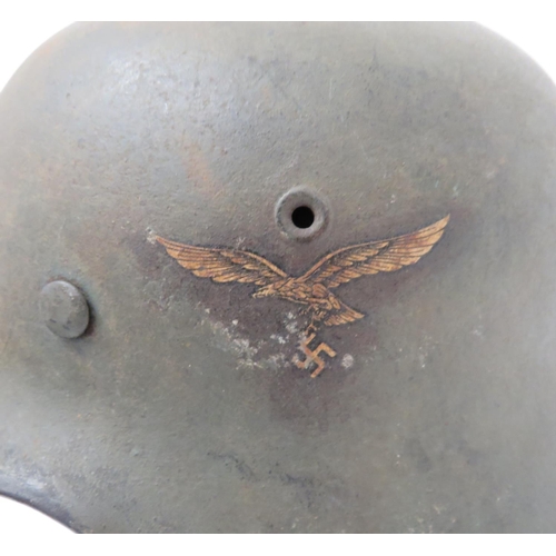 383 - Third Reich German M1940 Luftwaffe Steel Helmet
dark green overpainted steel shell around the Luftwa... 