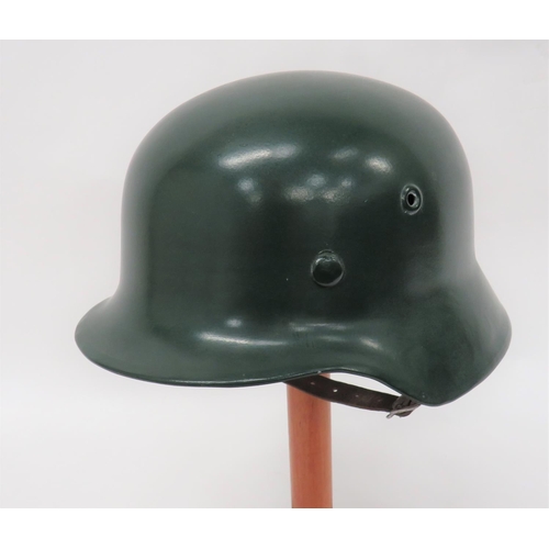 385 - German Model 1940 Steel Helmet
olive green, repainted steel helmet with lower rolled edge brim. &nbs... 