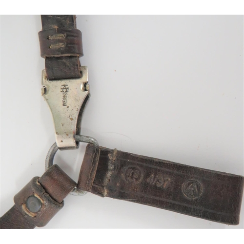 391 - German Third Reich SA Dagger Hanging Strap
brown leather belt loop stamped RZM 4/37.  Steel joi... 