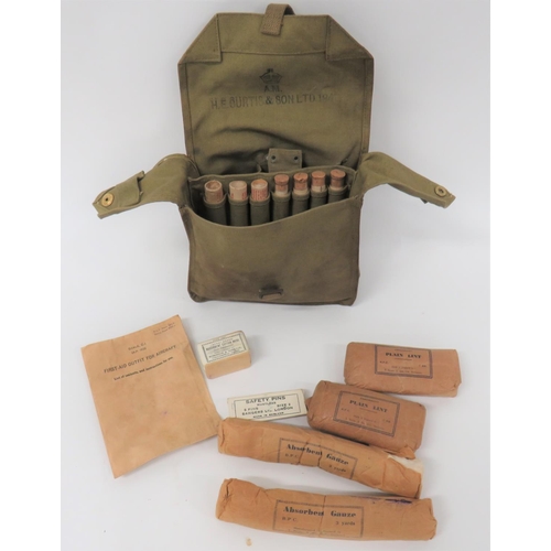 418 - WW2 RAF Aircraft First Aid Kit
khaki green canvas, square pack.  Top flap secured by a strap an... 