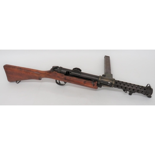 434 - Deactivated Lanchester Sub Machine Gun
9 mm, 8 inch barrel.  Pierced shroud with front hooded s... 