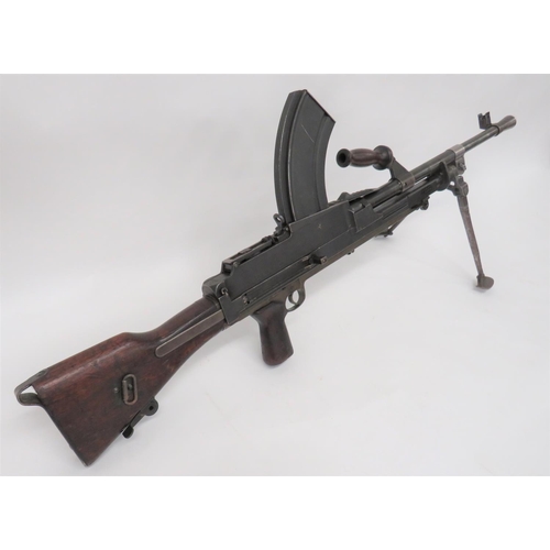 438 - Deactivated MKII Bren Light Machine Gun
.303, 24 inch barrel with front flash hider and side mounted... 