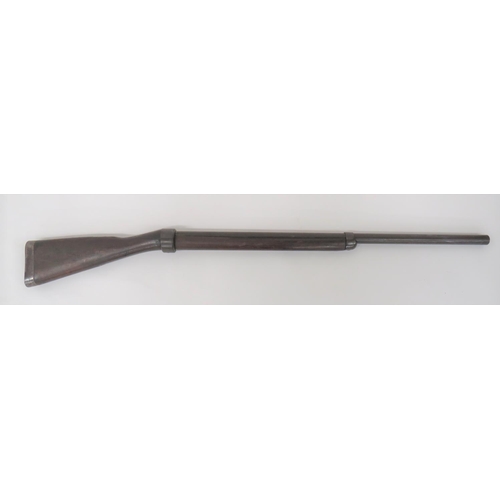 439 - Early 20th Century Bayonet Practice Rifle
32 inch barrel.  Front plunger rod absent.  Rear breech st... 