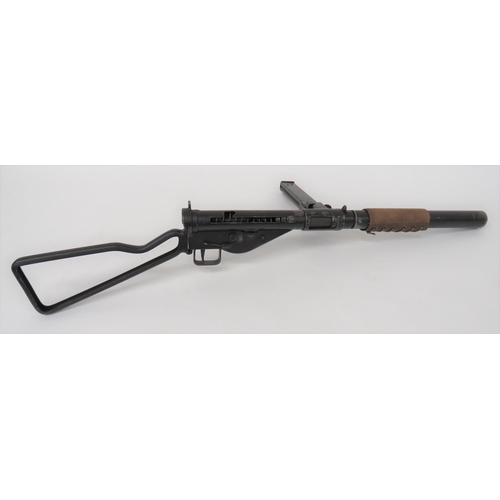 453 - Deactivated MKII Silenced Sten Gun
blackened silencer complete with canvas heat wrap.  Blackene... 