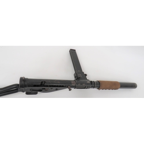 453 - Deactivated MKII Silenced Sten Gun
blackened silencer complete with canvas heat wrap.  Blackene... 