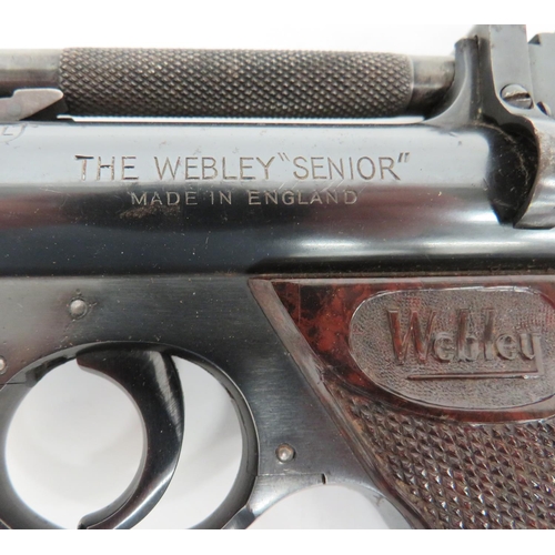 456 - Webley Senior Air Pistol
.22, 6 1/2 inch, blued barrel with checkered rear section.  Lift up ba... 