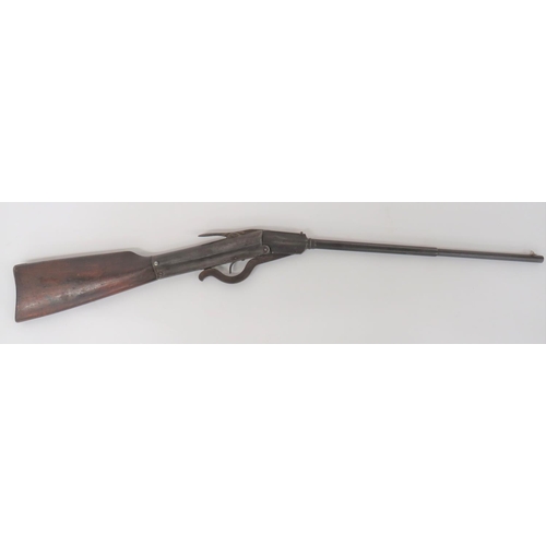 Early German Made Gem Air Rifle
.177, 18 3/4 inch, part octagonal with large breech hinged barrel.  Front blade sight and rear V sight.  Top of barrel marked "Gem. Manufactured In Germany".  Lower steel cocking trigger guard.  Top barrel release spoon.  Tubular body.  Polished wooden butt with steel butt plate.  Steel with dark patina.  
