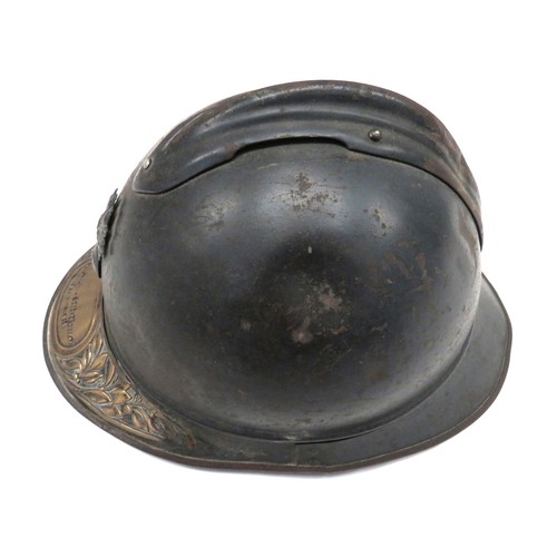 201 - WW1 Period French Infantry Helmet
blue grey painted crown with top attached comb.  Lower two part br... 