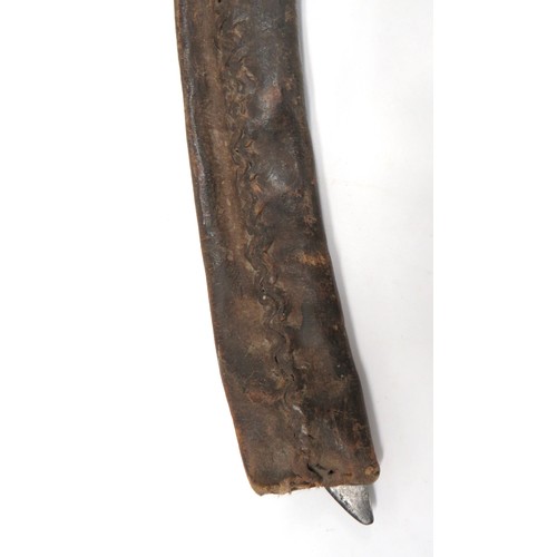 424 - 19th Century Sudanese Sword
31 3/4 inch, single edged, slightly curved blade with large fuller of Br... 