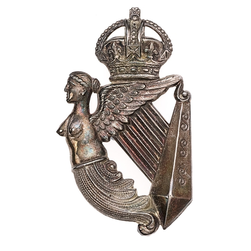 8th King's Royal Irish Hussars post 1901 NCO's arm badge.  Fine scarce die-stamped unmarked silver crowned voided Maid of Erin Harp with non-voided strings. Two loops. VGC