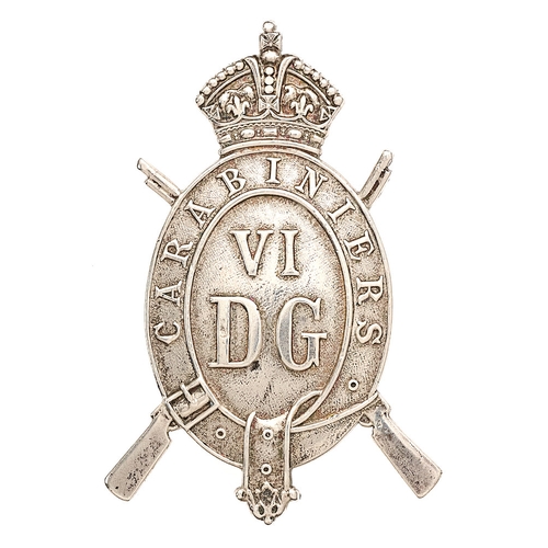 6th Dragoon Guards NCO's 1922 HM silver arm badge.  Fine and rare example by Goldsmiths and Silversmiths Co. Ltd. London hallmarked crowned oval strap CARABINIERS superimposed on crossed carbines; VI DG to solid centre. Loops. GC