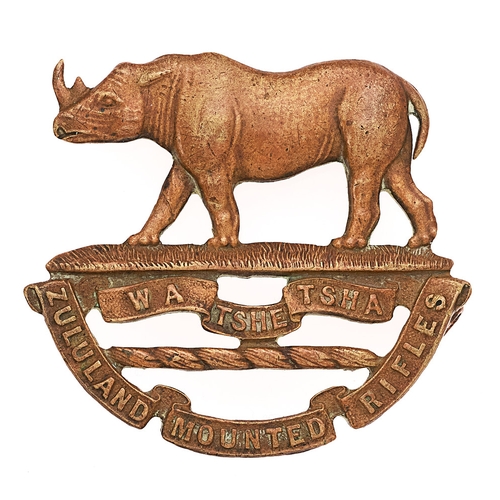 162 - South Africa. Zululand Mounted Rifles cap badge circa 1904-13.  Scarce die-cast brass Rhinoceros ove... 