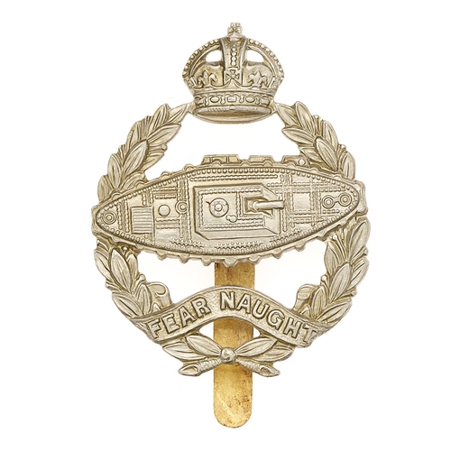 Royal Tank Regiment 1924 beret badge.  Good scarce die-stamped white metal crowned laurel sprays bearing a backward facing tank (facing viewers right) and scroll FEAR NAUGHT  to voided centre.    Slider.  VGC
