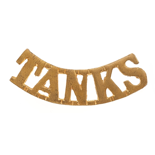 347 - TANKS WWI Tank Corps shoulder title.  Good scarce curved die-cast brass issue.    Loops.  VGC