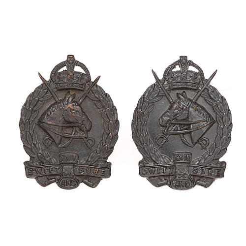 Australian 23rd Light Horse Regiment (Barossa Light Horse) facing pair of collar badges c1930-42.  Good scarce die-stamped blackened brass crowned laurel sprays resting on XXIII SWIFT AND BOLD scrolls; horse's head superimposed on crossed swords to solid centre. (2 items)    Loops (flat type).  VGC