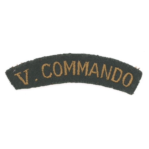 363 - V COMMANDO WW2 embroidered shoulder title.  Good scarce machine embroidered golden yellow letters on... 