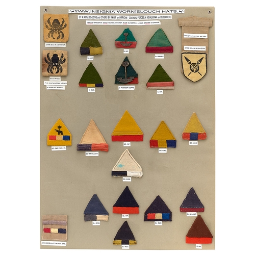 391 - 22 badges worn on WW2  slouch hats by African units  etc.  Board with good display of mainly cloth b... 