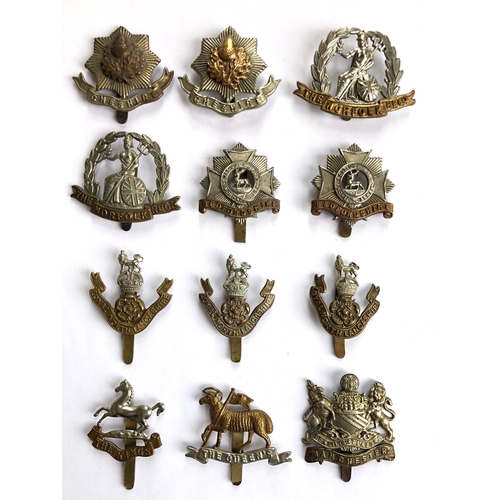 465 - 12 British Infantry WW1 Pattern Cap Badges.  2 x Cheshire ... 2 x Norfolk ... 2 x Bedford (1 slider ... 