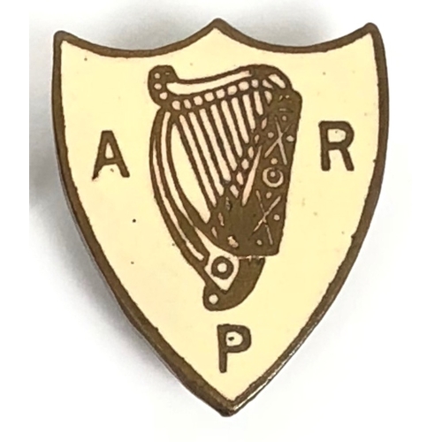 117 - WW2 era Home Front Irish numbered ARP Badge.  A scarce brass and cream enamel shield shaped example ... 