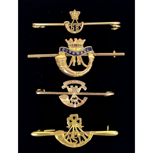 4 British Light Infantry gold Regimental Sweetheart Brooches. Victorian 68th Regiment (Durham Light Infantry) unmarked yellow metal brooch, width Approximately 45mm ... Duke of Cornwall's Light Infantry Bar Stamped 9ct. Damage to the enamel Width Approximately 5cm ... Somerset Light Infantry reverse stamped 9ct Width Approximately 4cm ... King's Shropshire Light Infantry reverse stamped 9ct Width Approximately 45mm. All complete with pin and hook fittings. (4 items)