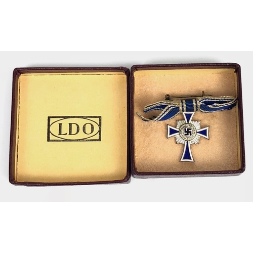 237 - German Third Reich MINIATURE boxed Mother's Cross 2nd Class.  Good silvered example with blue and wh... 