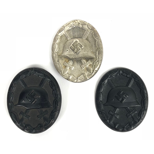 239 - German Third Reich 3 x various 1939 Wound Badges.  Silvered die-cast example retains hinged vertical... 