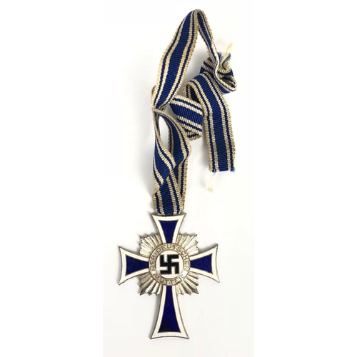 244 - German Third Reich. 2nd class Cross of Honour of the German Mother.  A good silvered example awarded... 