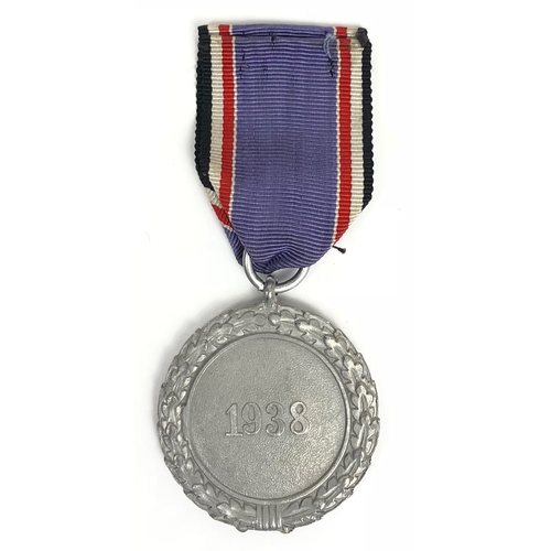 269 - German Third Reich 2nd Class Luftschutz Service Medal.  A good silvered aluminium example on ribbon.... 