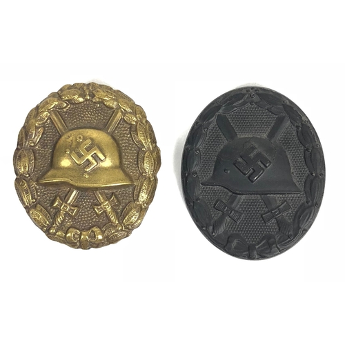 272 - German Third Reich 1937-39 Condor Legion Wound Badge and a 1939 example.  A good scarce die-stamped ... 