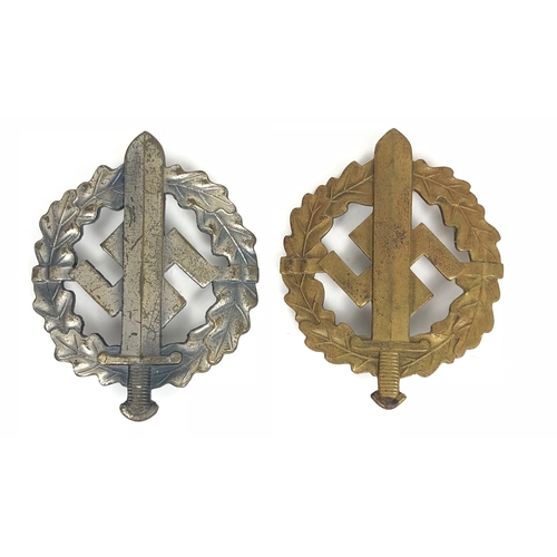 German Third Reich Stormtrooper SA Sports Badges, 2nd and 3rd Classes.  A good scarce silvered 2nd Class award. circa 1939-44 by W. Redo, Saur-Lautren. Upright Gladius style sword superimposed on swastika within oak wreath wreath. Hinged pin and securing hook to reverse with bears in relief Eigentum d. OBERSTEN sa. -FUHRUNG  ... bronze issue  by E.Schneider. Ludensheid bearing Eigentum des Chefs des Ausdildungswesens  to reverse and numbered 206986. Complete with needle pin and securing hook. GC (2 items)
