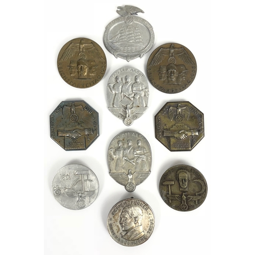 299 - German Third Reich. 10 assorted tinnies or day badges.  Most bearing swastikas in some form, all com... 