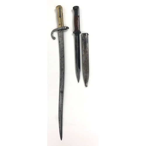 498 - German Third Reich 1938 dated K98 Bayonet and another. This example is stamped to the forte of the b... 