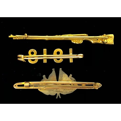 162 - WW1 Gold Patriotic Brooches. 3 Examples. Comprising: Gold rifle embossed 9CT Length 6cm. ... Gold co... 