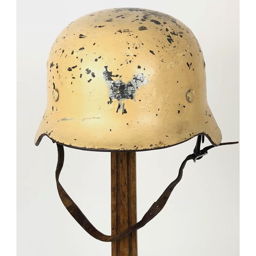 376 - German Third Reich Combat Steel Helmet.  This example with rolled edge example retaining sand cream ... 