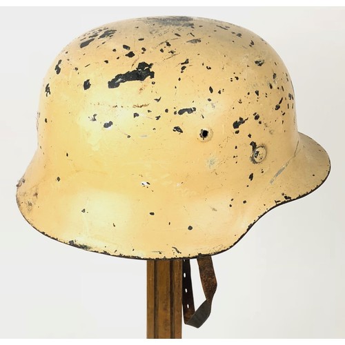 376 - German Third Reich Combat Steel Helmet.  This example with rolled edge example retaining sand cream ... 