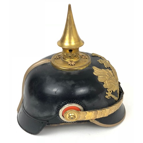 362 - WW1 Prussian Officer's Picklehaube.  A good Officer’s Picklehaube with rounded front peak and gilt m... 