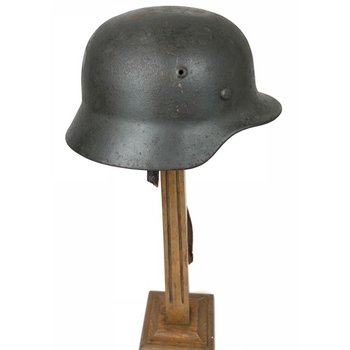 357 - German Third Reich Single Decal Steel Helmet.  A scarce rolled edge example with gold coloured eagle... 