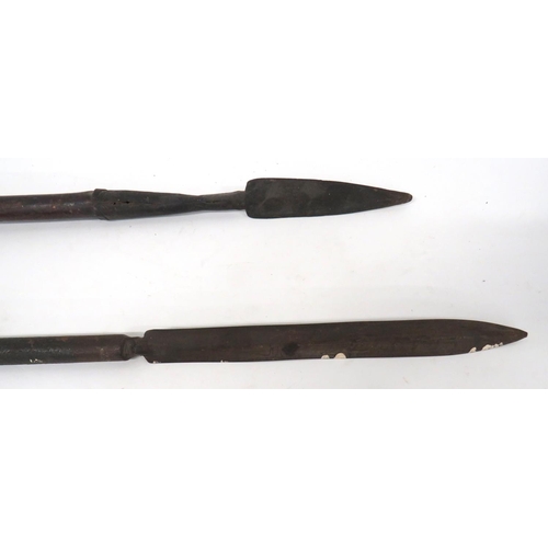 171 - Two 19th Century Spears
consisting an Indian example.  11 1/2 inch, double edged blade brazed into a... 