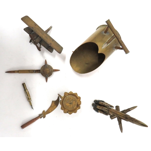 183 - Selection Of Bullet Trench Art Items
consisting bullet made bi-plane ... Shell and bucket coal scutt... 