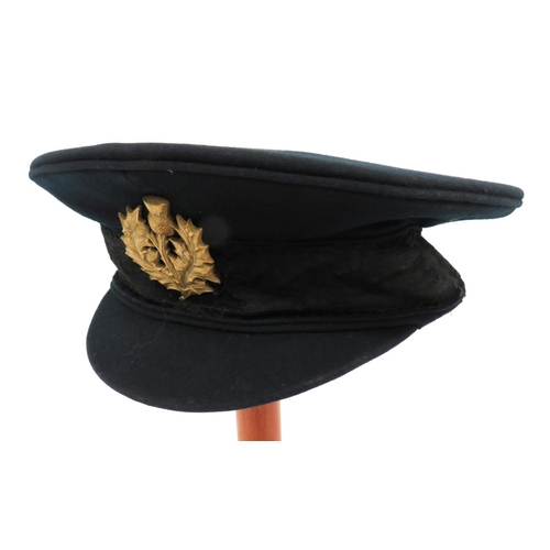 199 - Royal Company Of Archers Cap
dark green crown, body and small peak.  Black mohair thistle decorated ... 