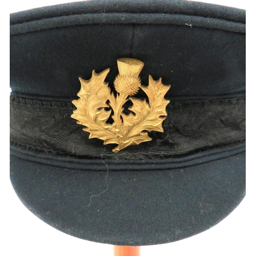 199 - Royal Company Of Archers Cap
dark green crown, body and small peak.  Black mohair thistle decorated ... 