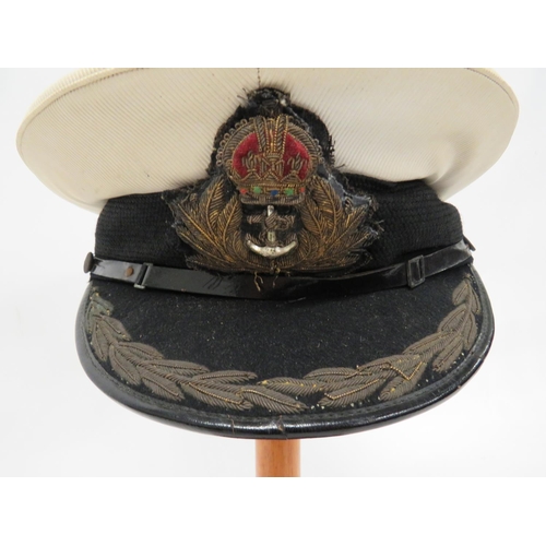 203 - Royal Navy Pre 1952 Commander's Service Dress Cap
white composite crown.  Black peak with bulli... 