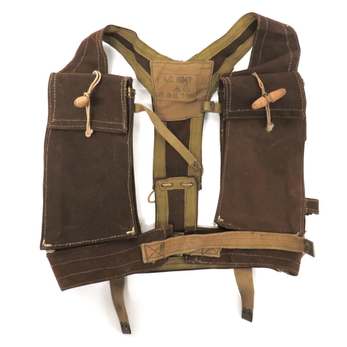 222 - WW2 Skeleton Assault Jerkin
brown canvas, double Bren magazine pouches fixed to shoulder Y strap and... 