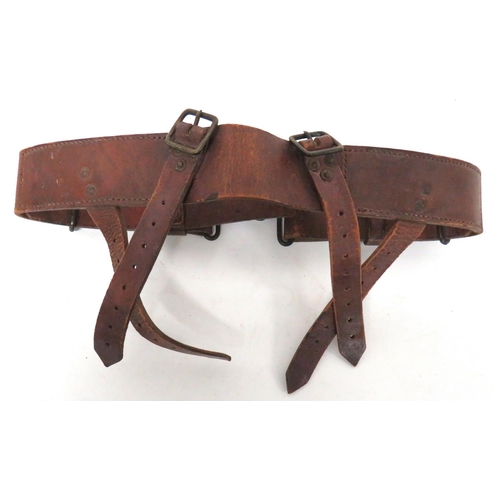 238 - 1914 Pattern Leather Equipment Belt
brown leather belt with brass adjustment buckles and front brass... 