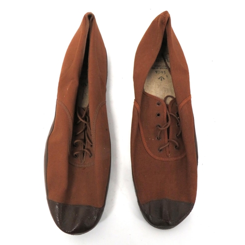 259 - Scarce Pair Of British 1941 Dated Plimsolls
brown canvas shoe section with front lacing.  Brown... 